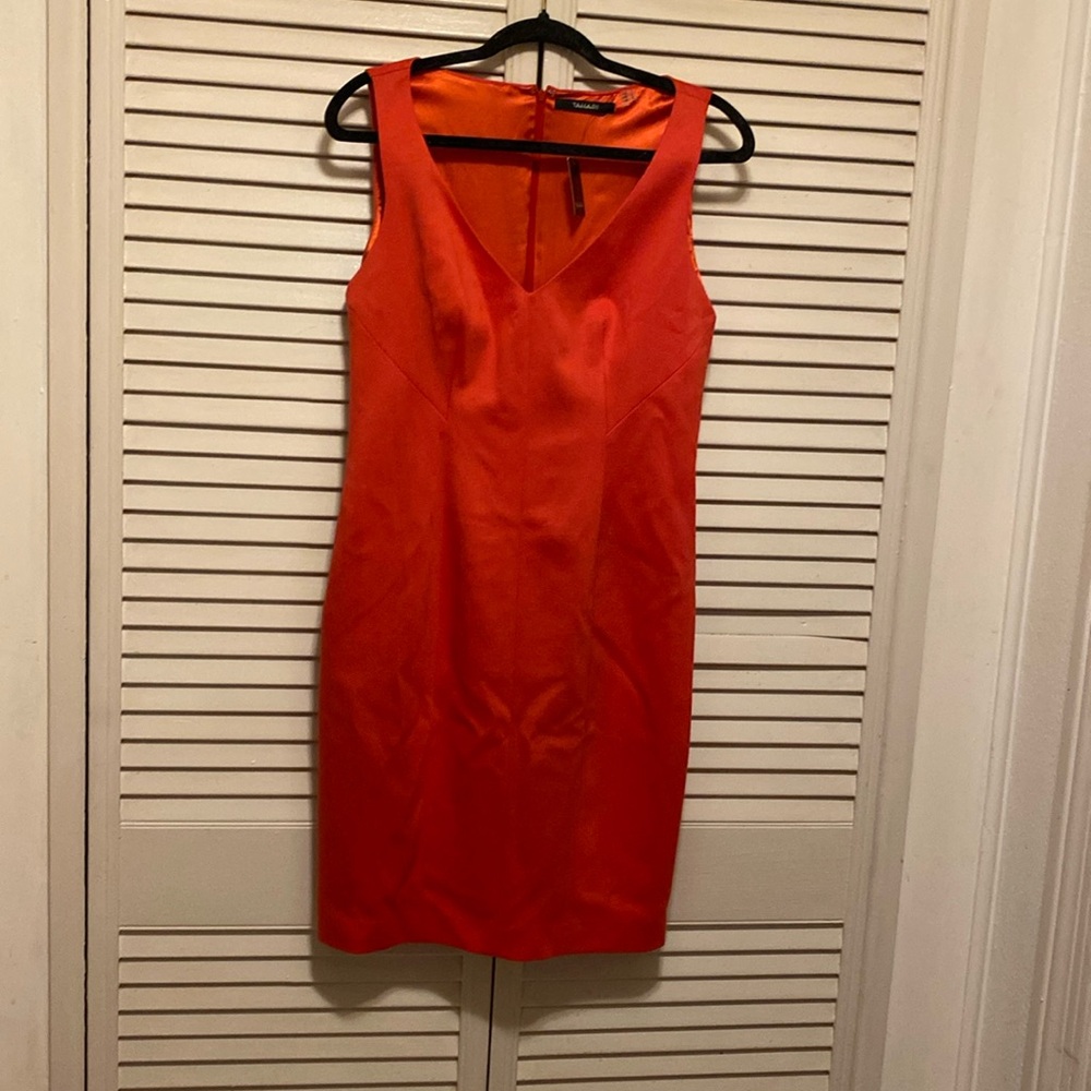 Casual/cocktail orange dress.